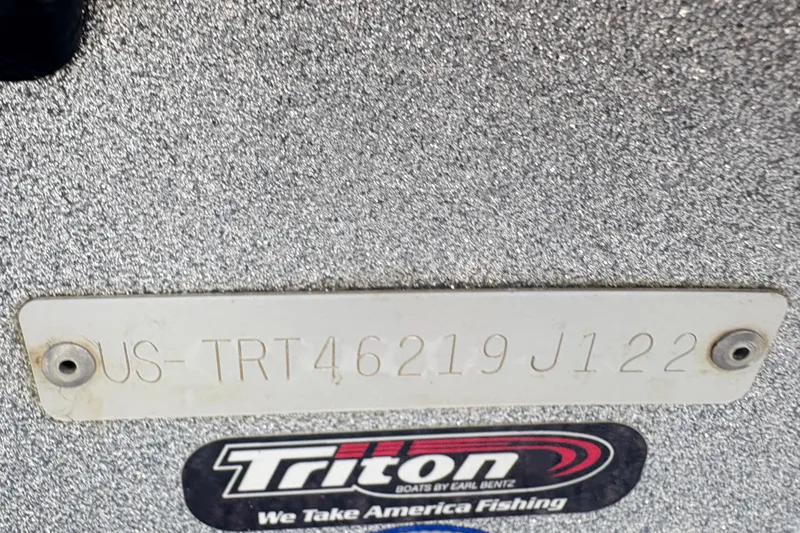 Slide: The Image of 2022 Triton 179 TrX boat identification plate with serial number and logo. - 13