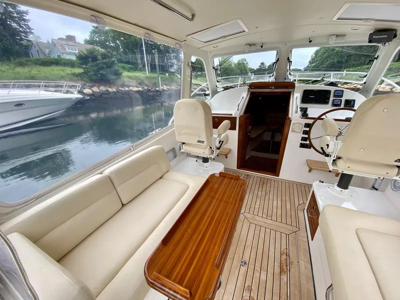 Slide: The Image of Interior of 2013 MJM 36z Downeast yacht with elegant seating and wooden flooring. - 15