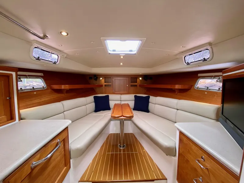 Slide: The Image of Luxurious interior of 2013 MJM 36z Downeast yacht with elegant seating and wood finishes. - 28