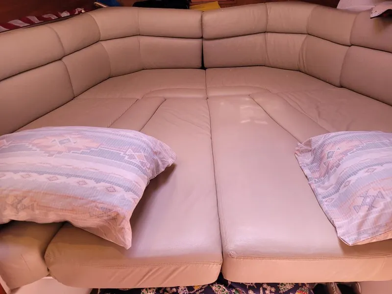 Slide: The Image of Luxurious beige leather seating area with pillows on a 2013 MJM 36z Downeast boat. - 32