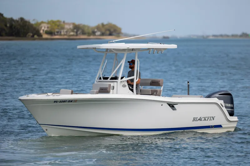 The Image of 2019 Blackfin 212 CC boat cruising on calm waters. - 0