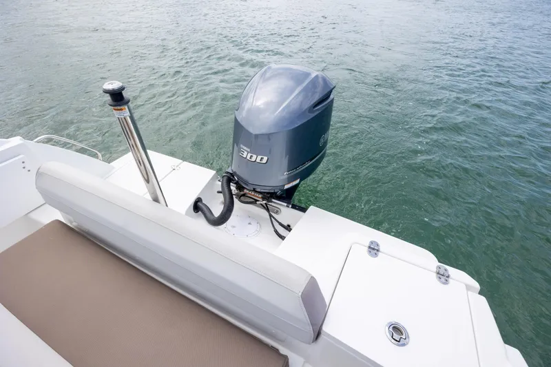 Slide: The Image of 2019 Blackfin 212 CC boat with Yamaha 300 outboard motor on water. - 24
