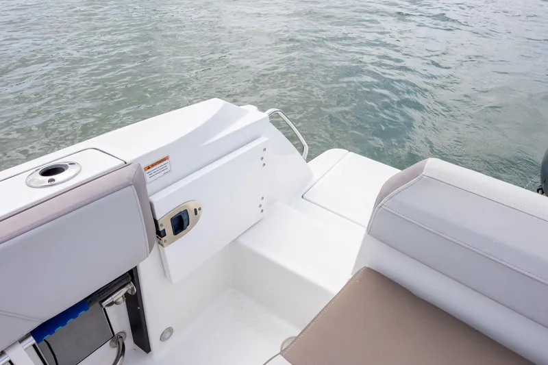 Slide: The Image of 2019 Blackfin 212 CC boat interior with seating and water view. - 28