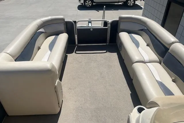 Slide: The Image of 2015 Godfrey Sweetwater 2286 C pontoon boat interior with spacious seating. - 18
