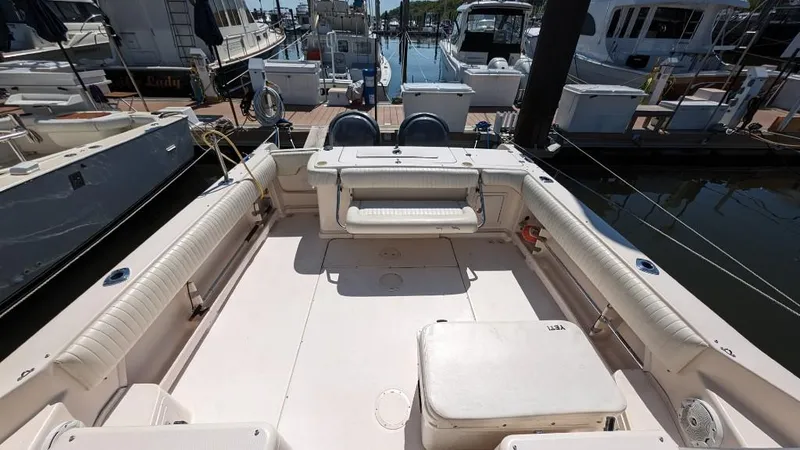 Slide: The Image of 2006 Grady-White Marlin 300 boat interior at a marina. - 6