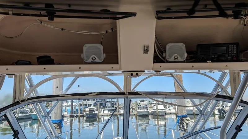 Slide: The Image of 2006 Grady-White Marlin 300 boat interior with marina view. - 9