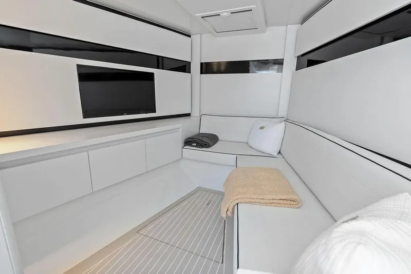 Slide: The Image of Luxurious interior of 2021 VanDutch 40.2 yacht with modern seating and TV. - 18