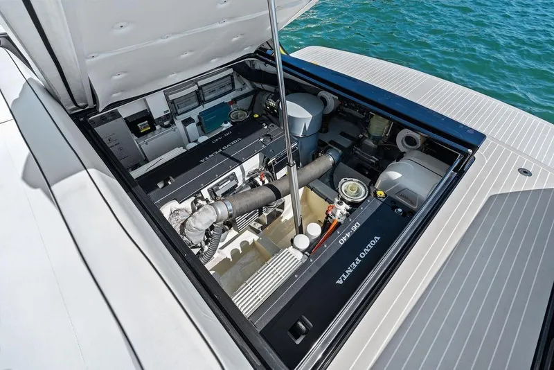 Slide: The Image of Engine compartment of 2021 VanDutch 40.2 yacht with Volvo Penta engine, open hatch. - 23
