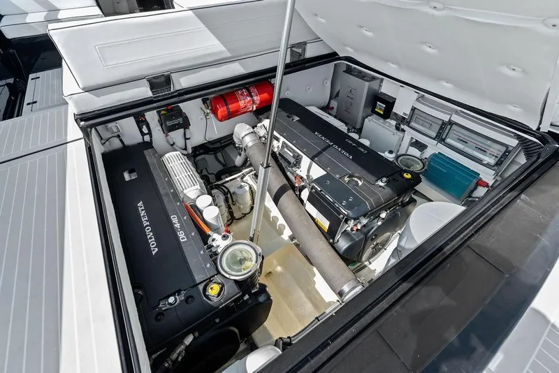 Slide: The Image of Engine compartment of 2021 VanDutch 40.2 yacht featuring Volvo Penta engines and safety equipment. - 24
