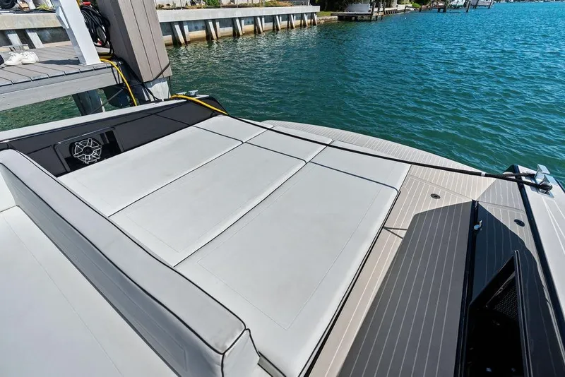 Slide: The Image of Luxurious 2021 VanDutch 40.2 yacht with spacious sun deck by the water. - 5