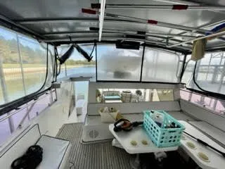 Slide: The Image of Interior of a 1996 President 545 yacht with seating area. - 16