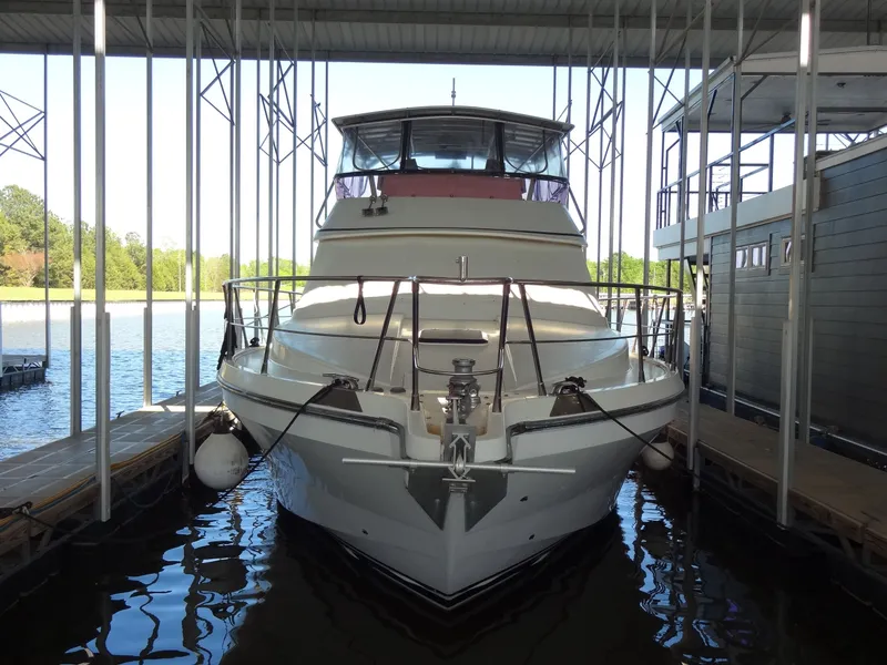 Slide: The Image of 1996 President 545 yacht docked in marina. - 2