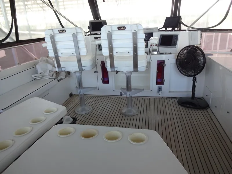 Slide: The Image of Interior of a 1996 President 545 boat with helm station. - 20