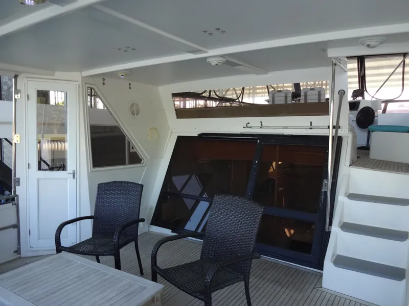 Slide: The Image of Interior of a 1996 President 545 yacht with seating area. - 24
