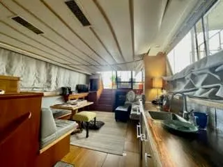 Slide: The Image of Interior of a 1996 President 545 yacht with modern furnishings. - 28