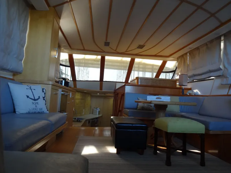 Slide: The Image of Interior of a 1996 President 545 yacht, cozy and stylishly furnished. - 29
