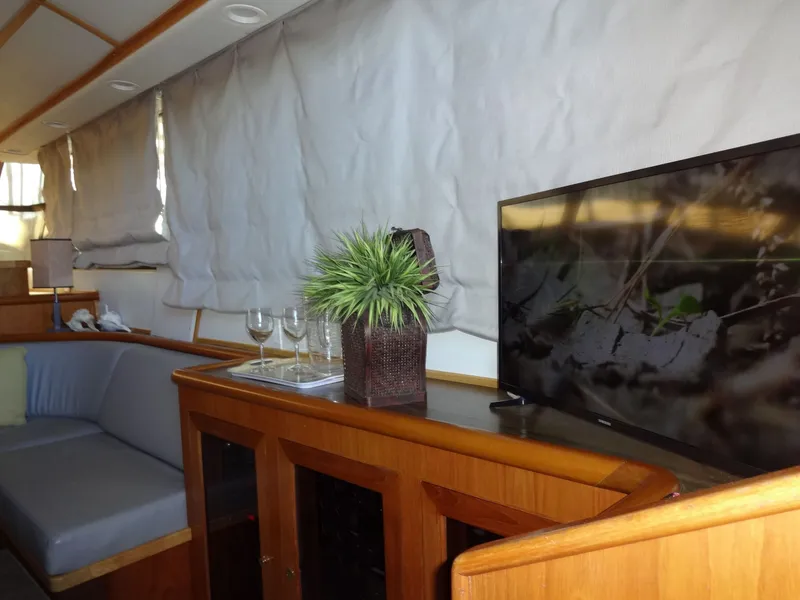 Slide: The Image of Interior of a 1996 President 545 yacht with TV and decor. - 30