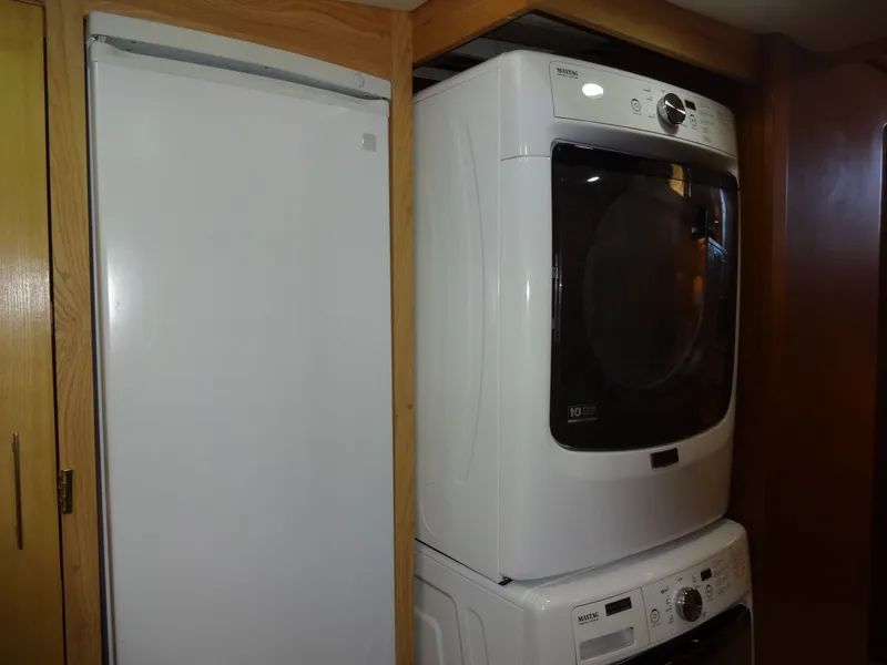 Slide: The Image of Washing machine and dryer in wooden cabinet, President 545 model, year 1996. - 39