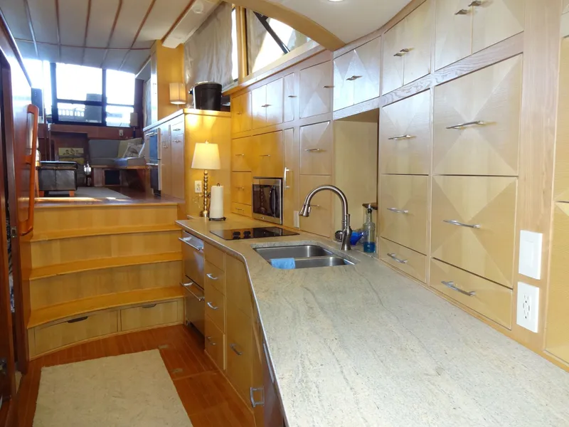 Slide: The Image of Luxurious kitchen on a 1996 President 545 yacht. - 41