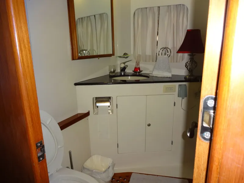 Slide: The Image of Bathroom in a 1996 President 545 yacht. - 44