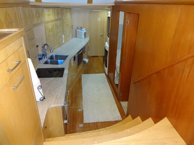 Slide: The Image of Interior of a 1996 President 545 yacht with modern kitchen. - 48