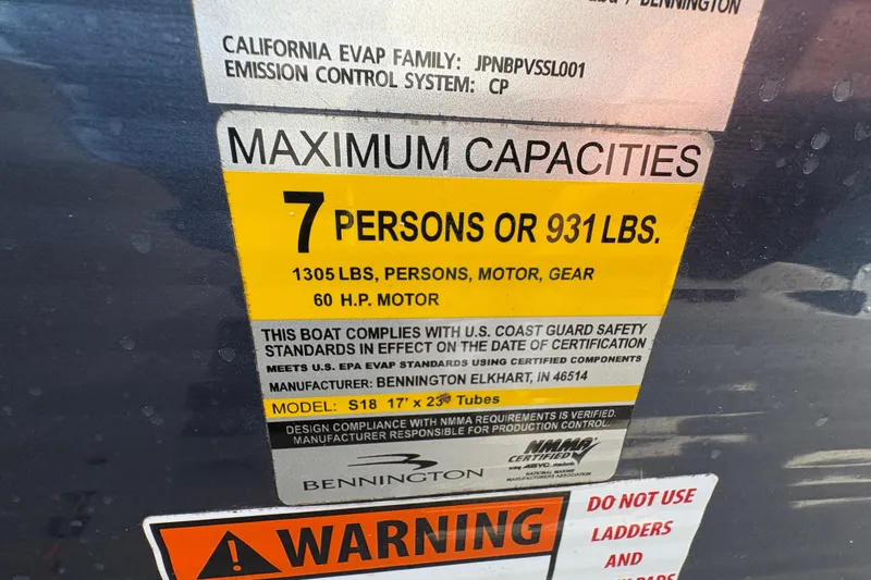 Slide: The Image of 2018 Bennington 188 SL boat capacity label, 7 persons or 931 lbs, 60 HP motor. - 18