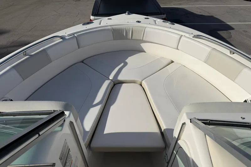 Slide: The Image of 2016 Robalo R227 Dual Console boat with spacious bow seating area. - 23