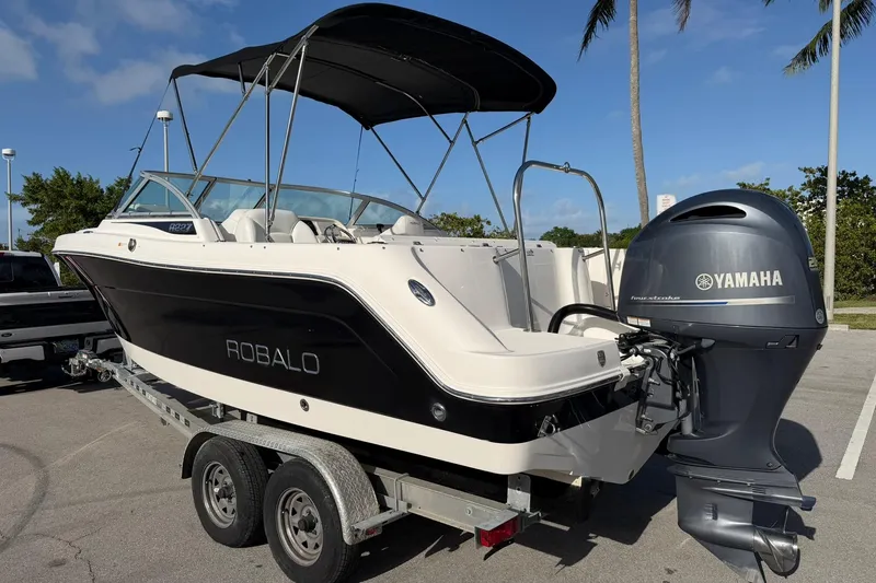 Slide: The Image of 2016 Robalo R227 Dual Console boat with Yamaha outboard engine on trailer. - 3