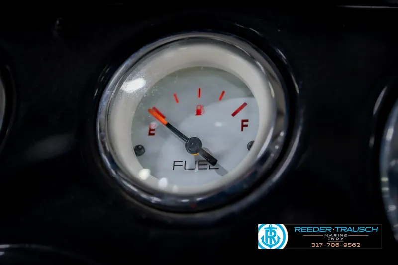 Slide: The Image of Fuel gauge of 2014 Crestliner 1650 Fish Hawk SE, showing empty. - 35
