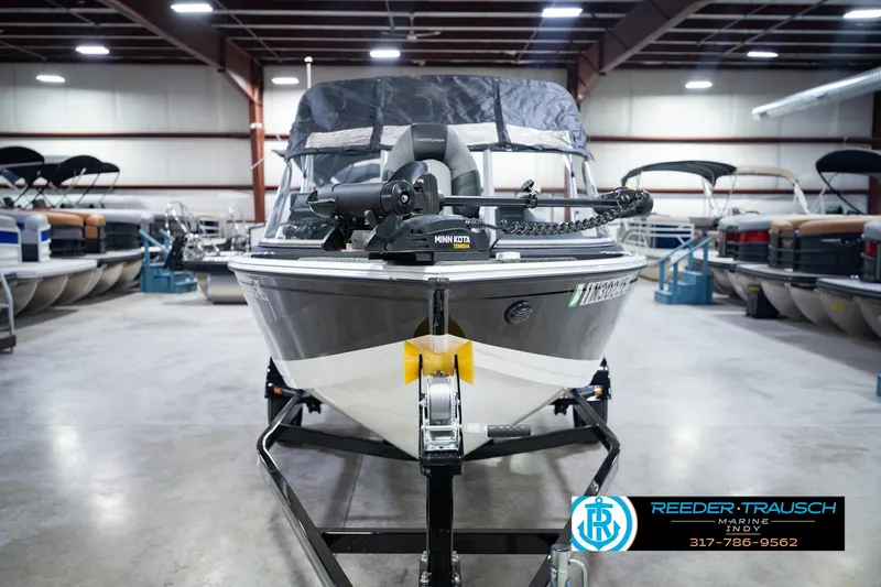 Slide: The Image of 2014 Crestliner 1650 Fish Hawk SE boat in showroom, front view. - 5