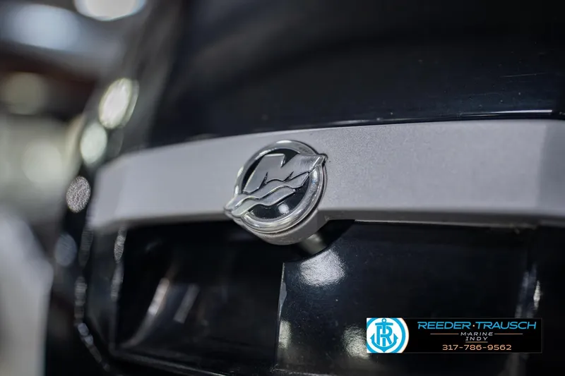 Slide: The Image of Close-up of a 2014 Crestliner 1650 Fish Hawk SE boat emblem. - 50