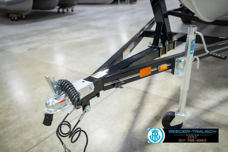 Slide: The Image of Trailer hitch of 2014 Crestliner 1650 Fish Hawk SE in showroom setting. - 57