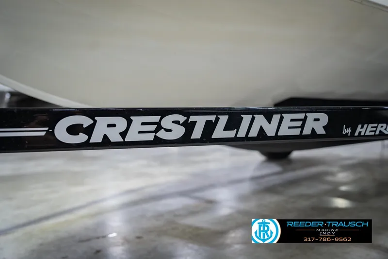 Slide: The Image of Crestliner 1650 Fish Hawk SE 2014 boat trailer detail with Reeder-Trausch Marine logo. - 58