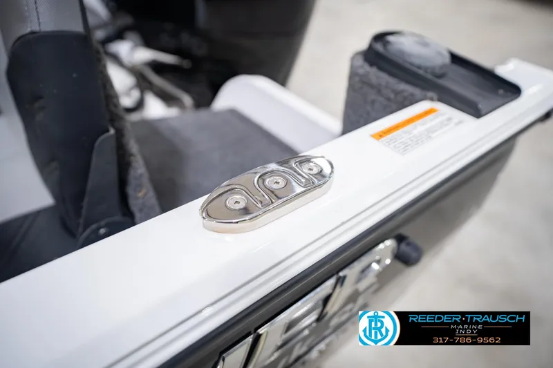 Slide: The Image of 2014 Crestliner 1650 Fish Hawk SE boat interior detail with control panel. - 59