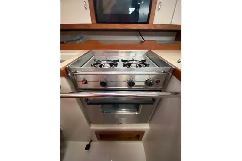 Slide: The Image of Stainless steel stove and oven in 1998 Catalina 36 MkII yacht kitchen. - 13
