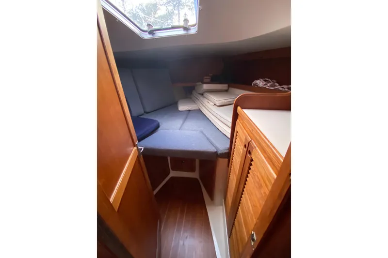 Slide: The Image of Cozy cabin interior of 1998 Catalina 36 MkII sailboat with wooden finishes. - 19