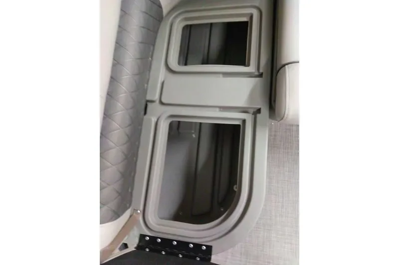 Slide: The Image of Storage compartments on the 2026 Sun Tracker Fishin' Barge 20 DLX boat interior. - 102