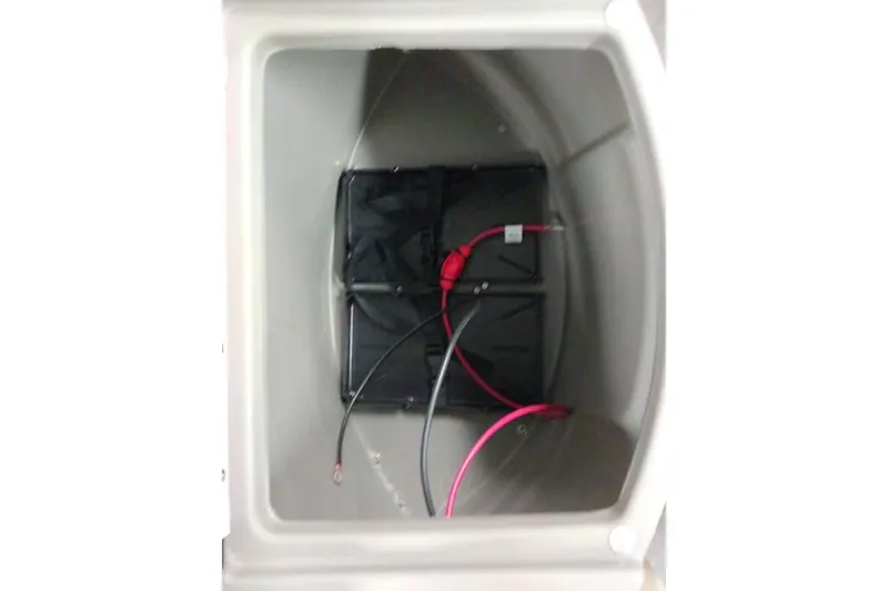 Slide: The Image of Battery compartment of 2026 Sun Tracker Fishin' Barge 20 DLX with wiring. - 104