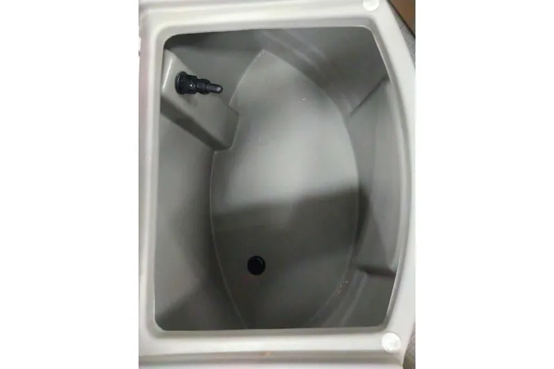 Slide: The Image of Interior view of 2026 Sun Tracker Fishin' Barge 20 DLX livewell compartment. - 105