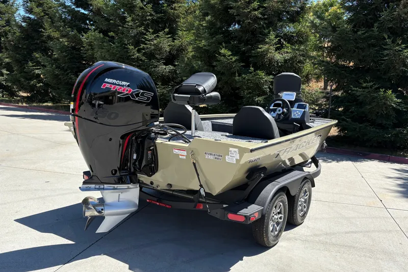 Slide: The Image of 2026 Tracker Pro Team 195 boat with Mercury Pro XS engine on trailer. - 13