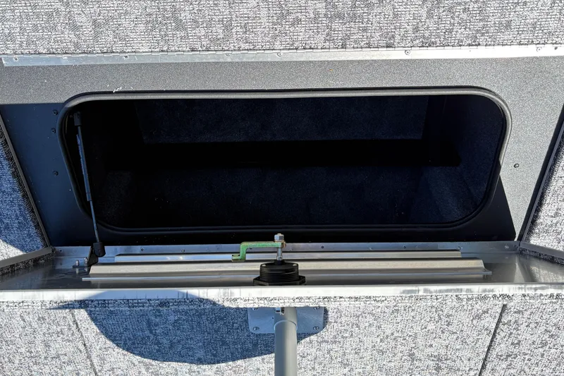 Slide: The Image of Open storage compartment in 2026 Tracker Pro Team 195 boat. - 36