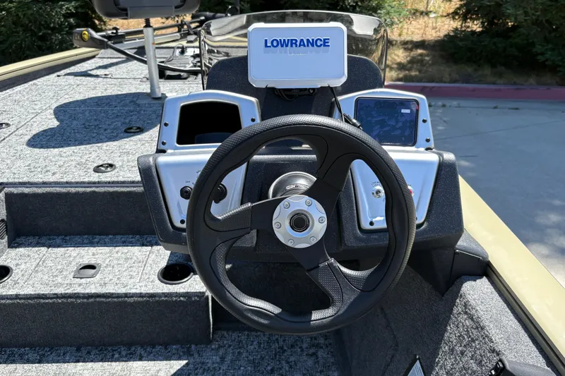 Slide: The Image of Steering console of 2026 Tracker Pro Team 195 boat with Lowrance electronics. - 26