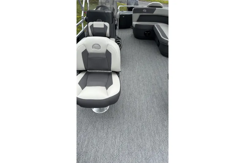 Slide: The Image of 2026 Sun Tracker Bass Buggy 18 DLX interior with comfortable seating and spacious layout. - 2