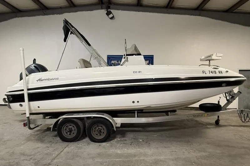 The Image of 2018 Hurricane boat on trailer in indoor storage facility. - 0