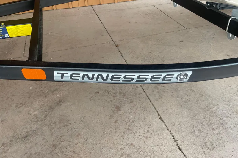 Slide: The Image of Trailer with "Tennessee" branding for 2026 Reaper Boats 653 Timber Reaper. - 12