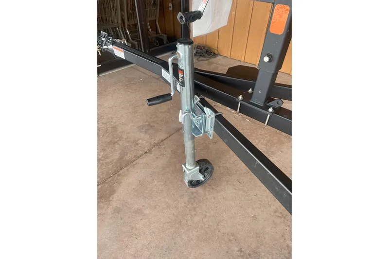 Slide: The Image of Trailer jack for 2026 Reaper Boats 653 Timber Reaper, featuring sturdy metal construction. - 13