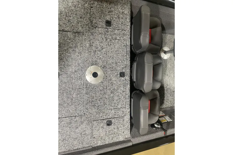 Slide: The Image of 2026 Tracker Pro Team 175 Crappie Edition boat interior with gray seating and storage compartments. - 10