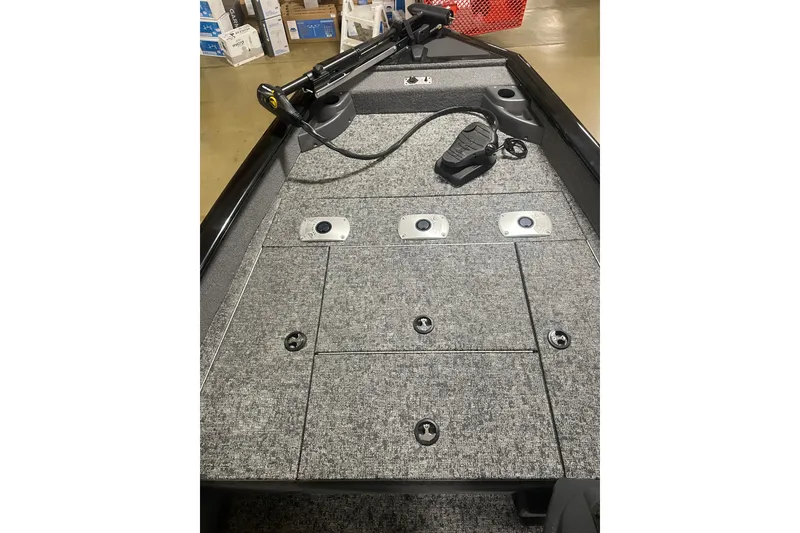 Slide: The Image of 2026 Tracker Pro Team 175 Crappie Edition boat interior with storage compartments. - 12