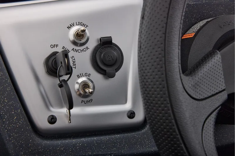 Slide: The Image of Manufacturer Provided Image: Control panel of 2026 Tracker Pro Team 175 Crappie Edition boat with key and switches. - 52