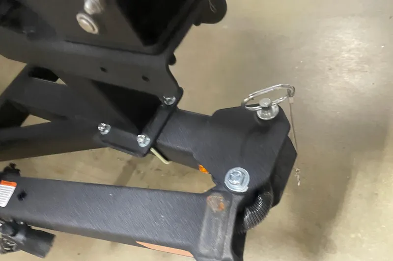 Slide: The Image of Trailer hitch of 2026 Tracker Pro Team 175 Crappie Edition boat, featuring secure locking mechanism. - 6